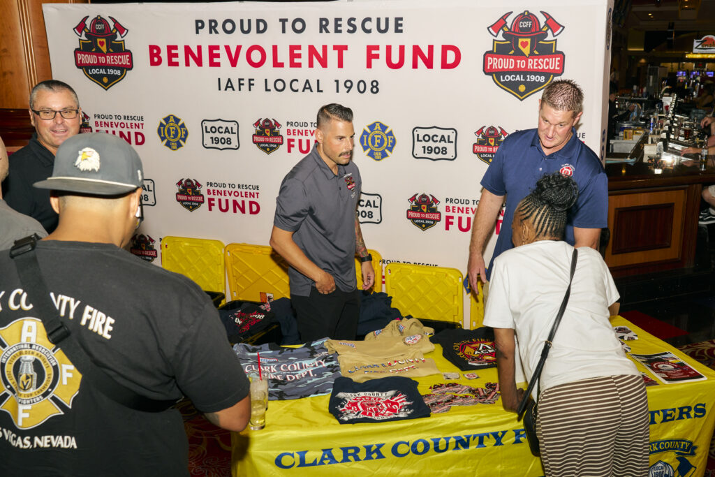 Clark County Fire Department fire fighters at SouthPoint casino in Las Vegas, Nevada, promoting the PTR charity poker tournament.